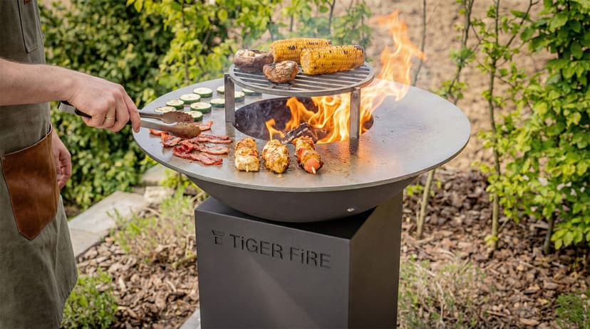 How do you create heat zones with a plancha BBQ?